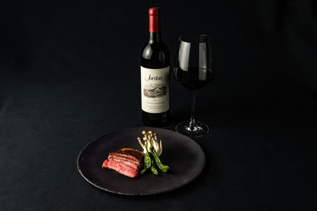 plate of fried fish, shrimp and calamari with a side dish of asparagus