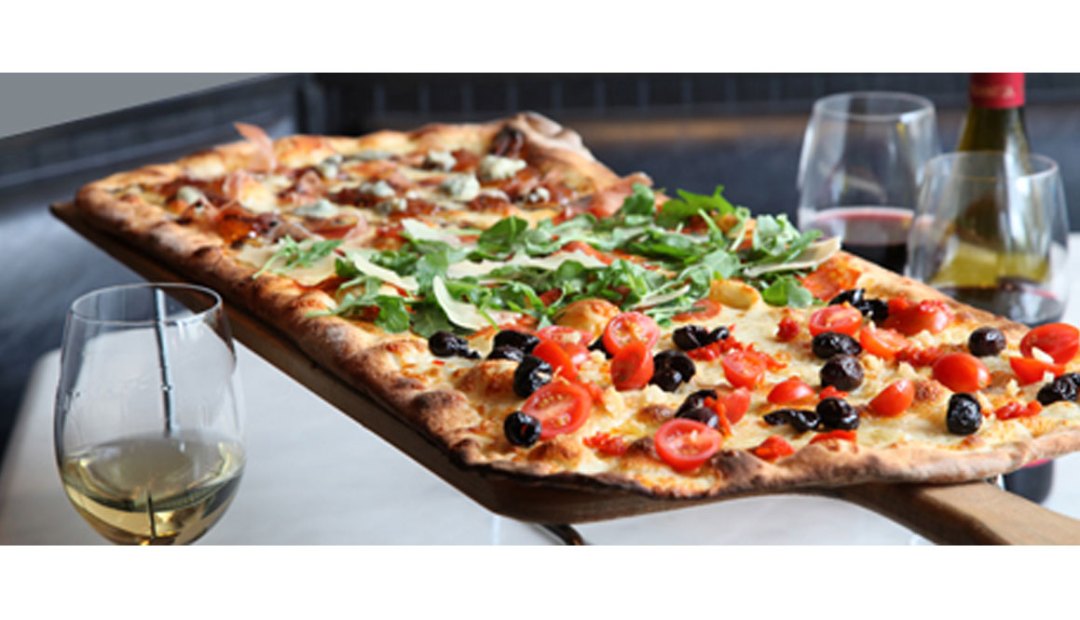 A photo of pizza with three different toppings