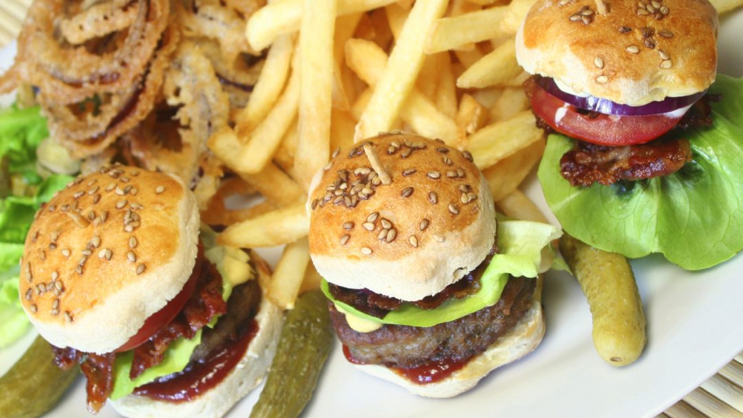 a photo of sliders and fries 